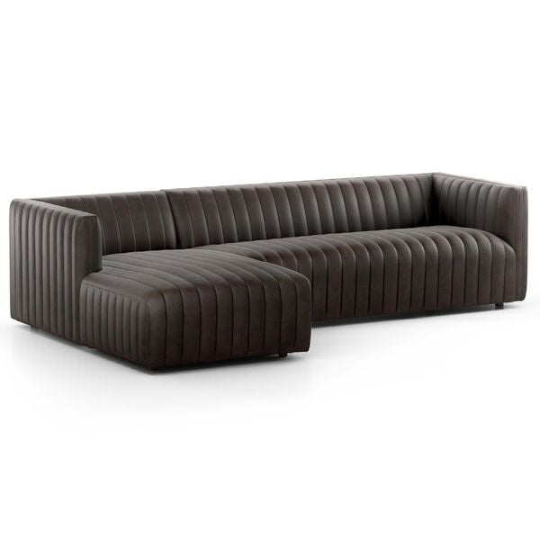 Sofa narozna o subtelnym charakterze z oszczednym detalem w odcieniu czerni